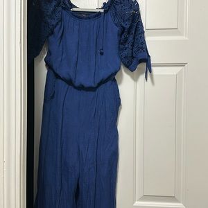 Blue jumpsuit!! SIZE: XL (16) in kids but fits an XS in women’s